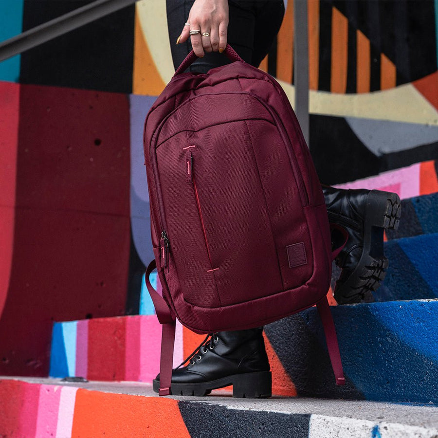 Combo Mochila Zilker Vino 15.6” + Audífonos Lisbon Coral